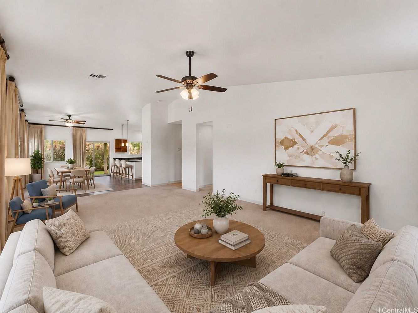Living room looking toward the dining area, breakfast bar and sliding doors to the yard